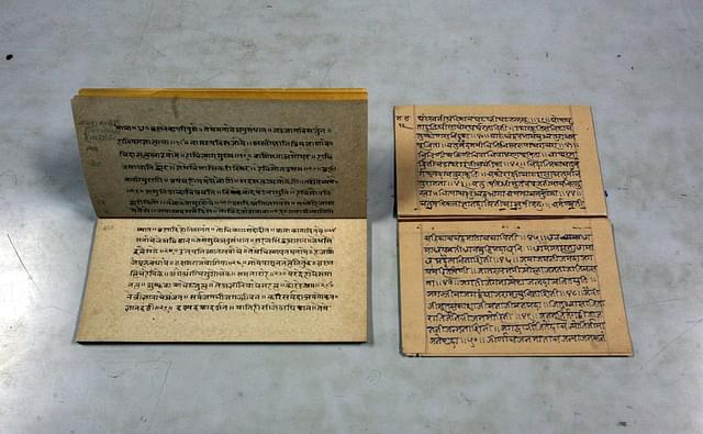Specimen of Sanskrit handwritten manuscripts. (Kalpak Pathak/Hindustan Times via GettyImages)