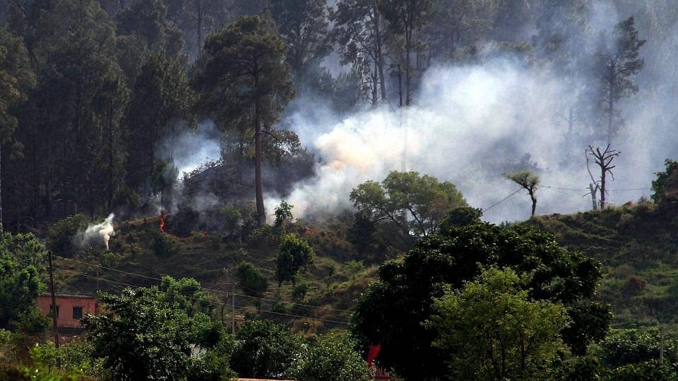 Smoke billows out after Pakistan army violates ceasefire in Rajouri area. (representative image) (PTI)