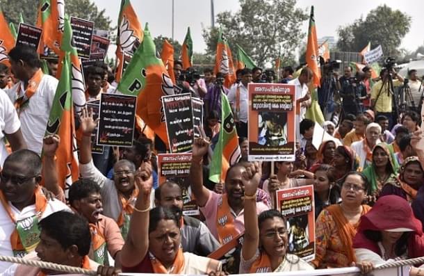 BJP supporters shout slogans during a ‘Jana Raksha Yatra’ from Central Park to CPI-M office in New Delhi, India. (Vipin Kumar/Hindustan Times via Getty Images)