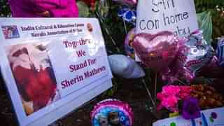 Photo, signs, flowers and other items are gathered at a memorial for Sherin Mathews.  (Ashley Landis/The Dallas Morning News via AP)&nbsp;
