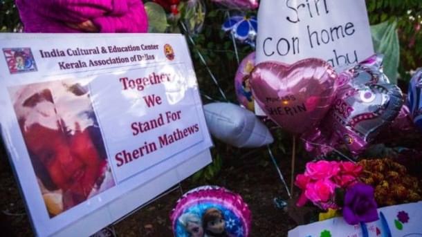 Photo, signs, flowers and other items are gathered at a memorial for Sherin Mathews. (Ashley Landis/The Dallas Morning News via AP) 