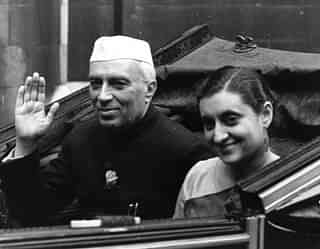  India’s first prime minister Jawaharlal Nehru (1869-1964), with his daughter Indira Gandhi (born Indira Priyardarshini Nehru, 1917-1984), the future prime minister. (Monty Fresco/Topical Press Agency/Getty Images)