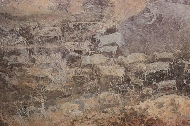 Paintings in a Rock Shelter in  Bhimbetka.(Wikipedia) 