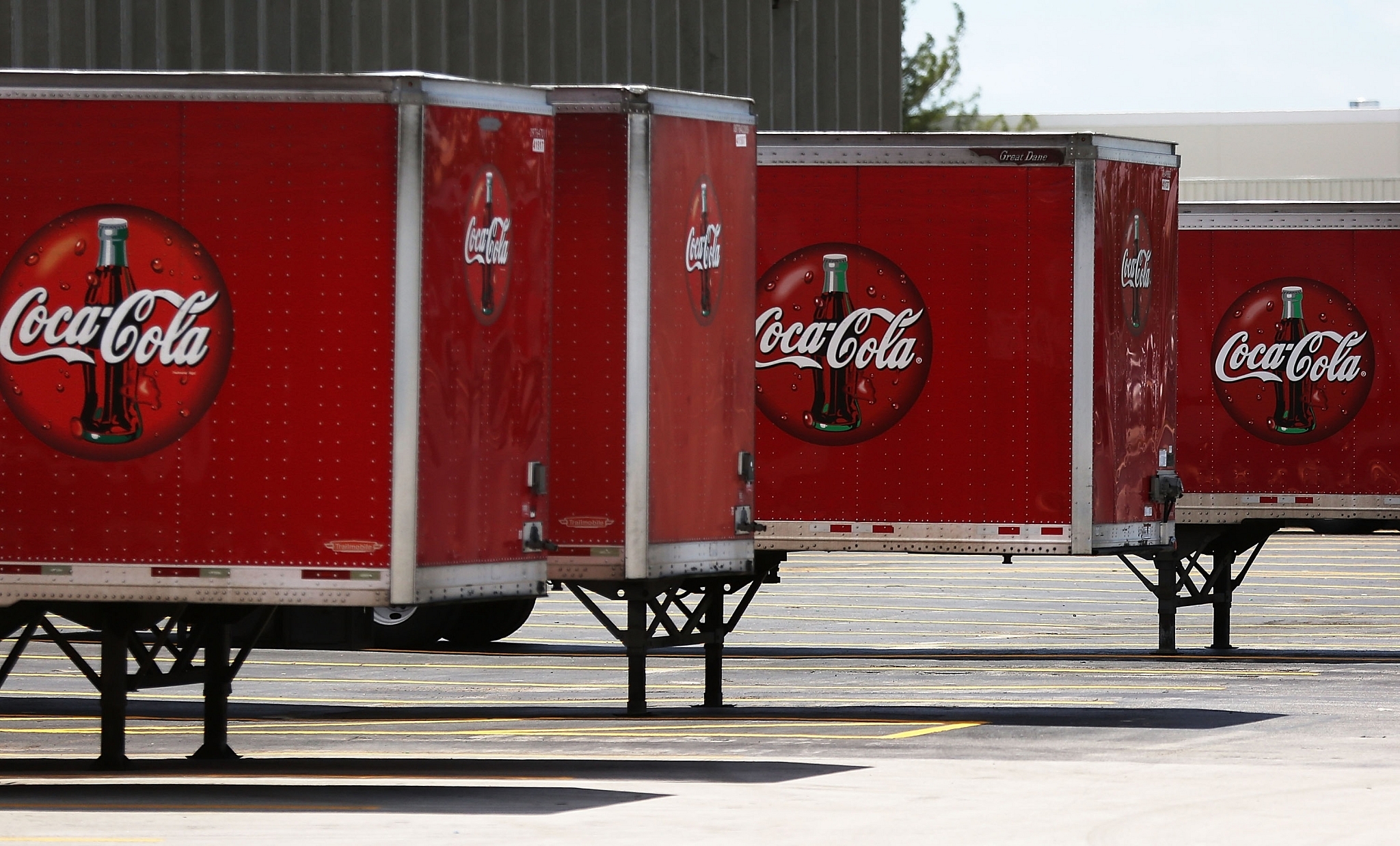 Coca Cola trucks are seen at a distribution center. (Joe Raedle/Getty Images)