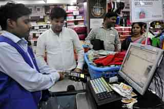 Customers using a card in Indore (Arun Mondhe/Hindustan Times via Getty Images)