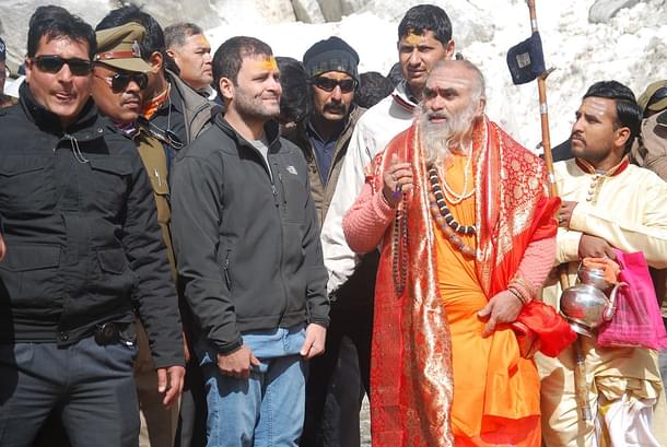 Congress Vice President Rahul Gandhi with the head priest Bheemashankar Ling at Kedarnath shrine on April 24, 2015 at Kedarnath (Vinay Santosh Kumar/Hindustan Times via Getty Images)