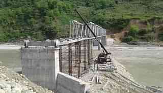 An under-construction truss bridge over the Kali Gandaki River