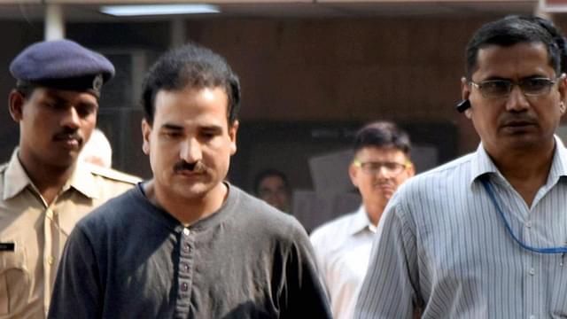 													Syed Shahid Yousuf, who was arrested by the NIA, being produced at the Patiala House Court in New Delhi. (PTI)