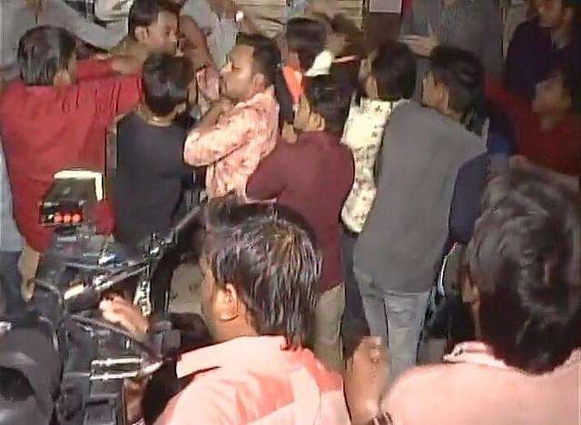 PAAS workers clash with Congress workers in Surat. (ANI/Twitter)