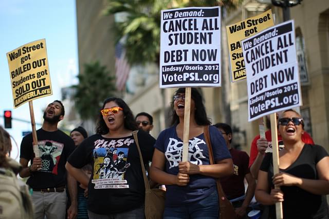 Students protest the rising costs of student loans for higher education on Hollywood Boulevard on September 22, 2012 in the Hollywood section of Los Angeles, California (David McNew/Getty Images)