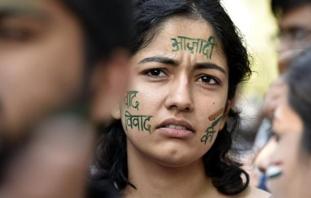 A student’s <i>azadi</i> word paint on her face during the citizens protest march in New Delhi. (Raj K Raj/Hindustan Times via Getty Images)