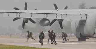 Commandoes take their position after alighting from C- 130 J. (Subhankar Chakraborty/Hindustan Times/ Getty Images)