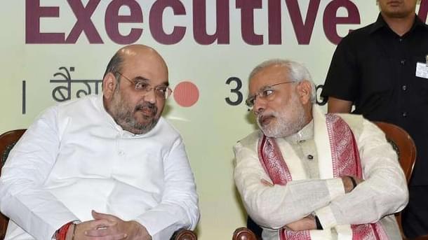 <p>Amit Shah and Narendra Modi</p>