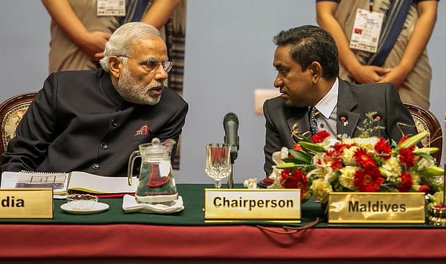 Prime Minister Narendra Modi speaks to Abdulla Yameen, President of the Maldives in Kathmandu, Nepal. (Narendra Shrestha - Pool/GettyImages)
