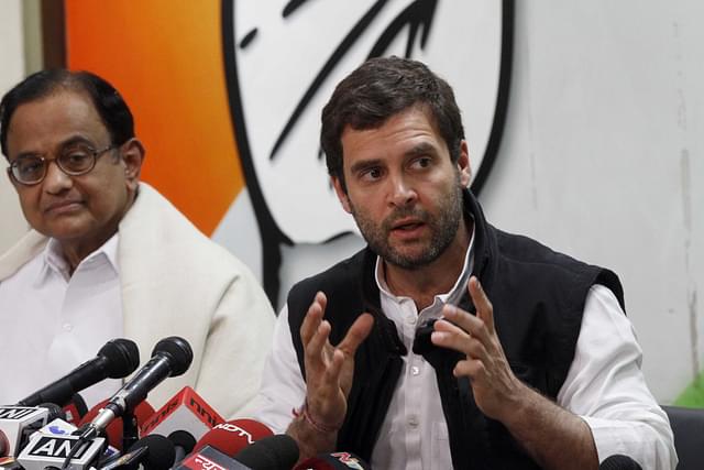 Rahul Gandhi with party leader P Chidambaram during a press conference at AICC office. (Sanjeev Verma/Hindustan Times via Getty Images)