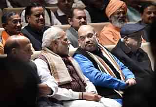 Prime Minister Narendra Modi (2L), Home Minister Rajnath Singh (L), BJP president Amit Shah (2R) and L K Advani celebrate after success in Gujarat. (Arvind Yadav/Hindustan Times)