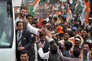 Congress president Rahul Gandhi shaking hands with people during a road show in Lucknow, in 2012, when he was the party’s general secretary. (Ashok Dutta/ Hindustan Times via Getty Images)