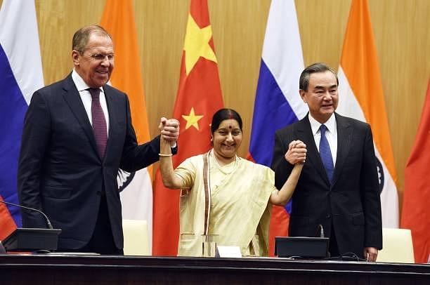 Russian Foreign Minister Sergey Lavrov (L), External Affairs Minister Sushma Swaraj (C) and Chinese Foreign Minister Wang Yi after a joint press conference  in New Delhi. (Raj K Raj/Hindustan Times via Getty Images)