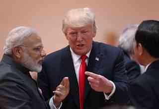 President Donald Trump chats with Prime Minister Narendra Modi on the second day of the G20 summit in Hamburg, Germany. (Sean Gallup/Getty Images)