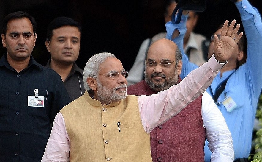Prime Minister Narendra Modi and Home Minister Amit Shah at a party event in Mumbai. (PUNIT PARANJPE/AFP/Getty Images)