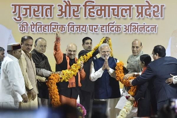 BJP leaders felicitating Prime Minister Narendra Modi and party president Amit Shah after Gujarat and Himachal Pradesh victories in New Delhi. (Sonu Mehta/Hindustan Times via Getty Images)&nbsp; &nbsp;