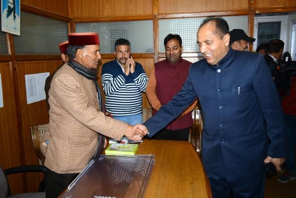 Jairam Thakur, right, meets senior BJP leaders in Shimla. (Deepak Sansta/Hindustan Times via Getty Images) 