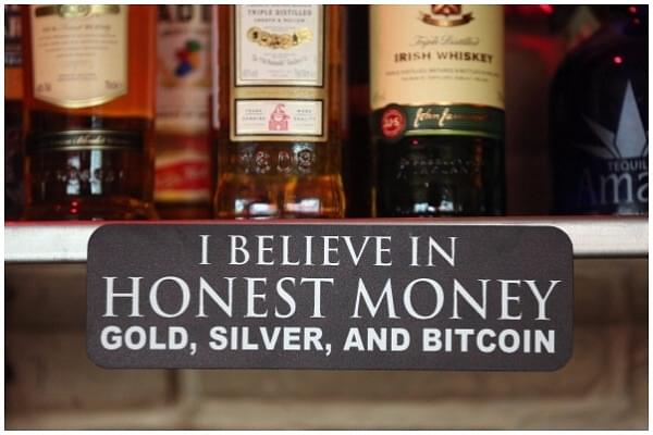 A sign announces a proprieter’s loyalty to Bitcoins, where they are also accepted for payment, at a pub on April 11, 2013 in Berlin, Germany. (Sean Gallup/Getty Images)