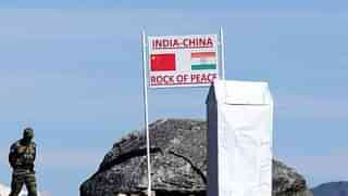 An Indian Army soldier keeps vigil at Bumla pass at the India-China border. (BIJU BORO/AFP/GettyImages)