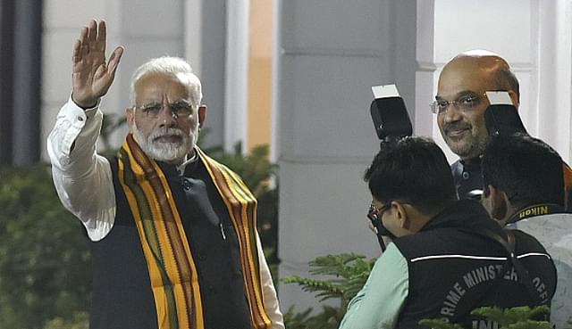 Prime Minister Narendra Modi arrives at the BJP headquarters at Ashoka Road in New Delhi. (Raj K Raj/Hindustan Times)