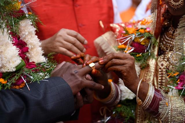 A marriage in India. (Burhaan Kinu/Hindustan Times via Getty Images)