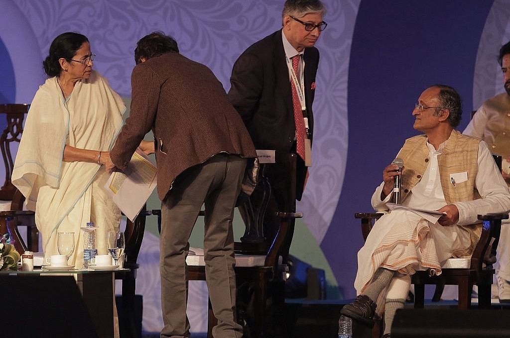 Bengal Chief Minister Mamata Banerjee and Finance Minister Amit Mitra at the Bengal Global Business Summit 2016 in Kolkata. (Indranil Bhoumik/Mint via Getty Images)
