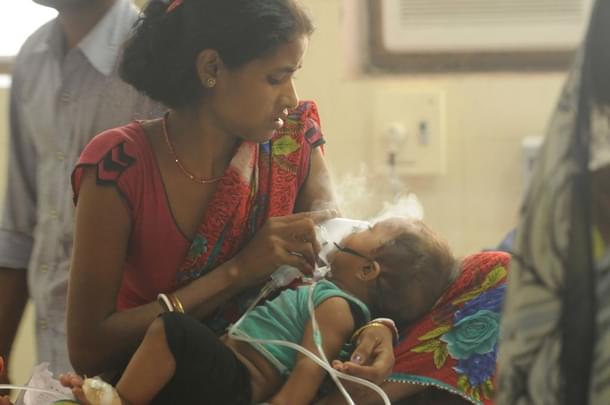 A child admitted inside encephalitis ward at BRD hospital in Gorakhpur. (Deepak Gupta/Hindustan Times via Getty Images) 