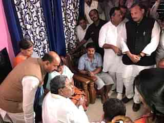 Karnataka Chief Minister S Siddaramaiah visiting Deepak Rao’s house; his cabinet colleague U T Khader, MLA Mohideen Bava and MLC Ivan D’Souza are seen.