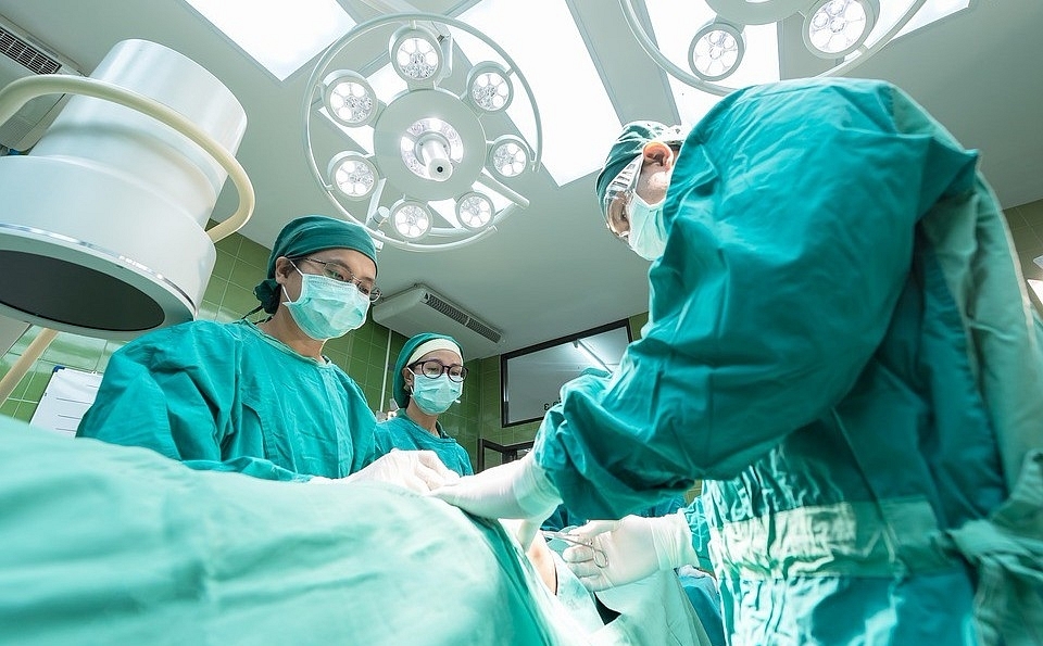 Doctors performing a surgery.