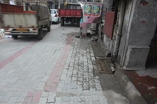 Tiles are laid on the road leading to Harmandir Sahib, and open drains are replaced with covered ones.