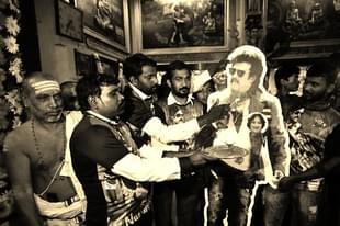 Rajinikanth fans doing <i>aarti</i> in front of his cut-out on the release of <i>Kabali</i> at Matunga Murugan Temple on in Mumbai, India. (Arijit Sen/Hindustan Times via Getty Images)