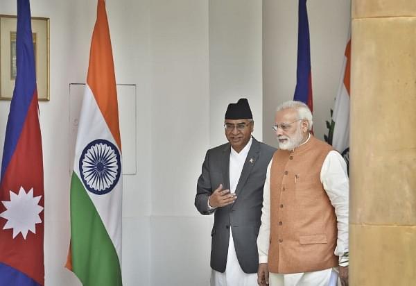 Prime Minister Narendra Modi with Nepalese Prime Minister Sher Bahadur Deuba before a meeting at Hyderabad House in 2017. (Ajay Aggarwal/Hindustan Times via Getty Images)