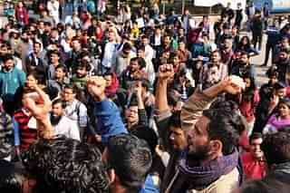 Students in Jawaharlal Nehru University protesting (Burhaan Kinu/Hindustan Times via Getty Images)