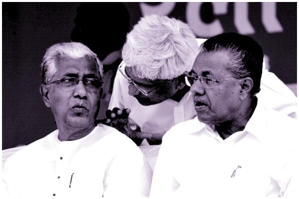 Former CPI-M general secretary Prakash Karat (C) speaks to the chief minister of Tripura, Manik Sarkar, as Kerala Chief Minister Pinarayi Vijayan looks on. (Arijit Sen/Hindustan Times via Getty Images)