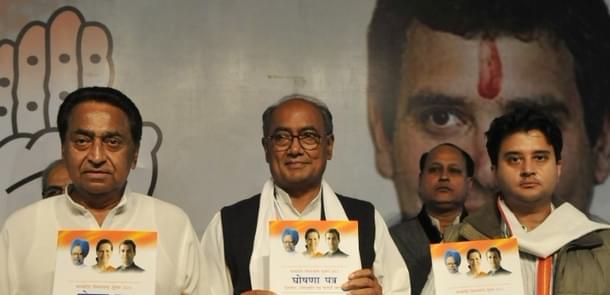 Kamal Nath (L) with Digvijaya Singh and Jyotiraditya Scindia (R). (Mujeeb faruqui/Hindustan Times via Getty Images)
