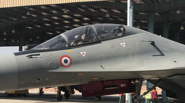 Defence Minister Nirmala Sitharaman in the cockpit of the Sukhoi-30 MKI before taking off for a sortie. (Indian Air Force/Twitter)