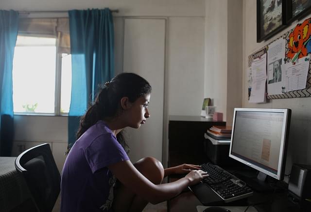 Vanya Bisht using the internet on an LCD desktop. (Sattish Bate/Hindustan Times via Getty Images)