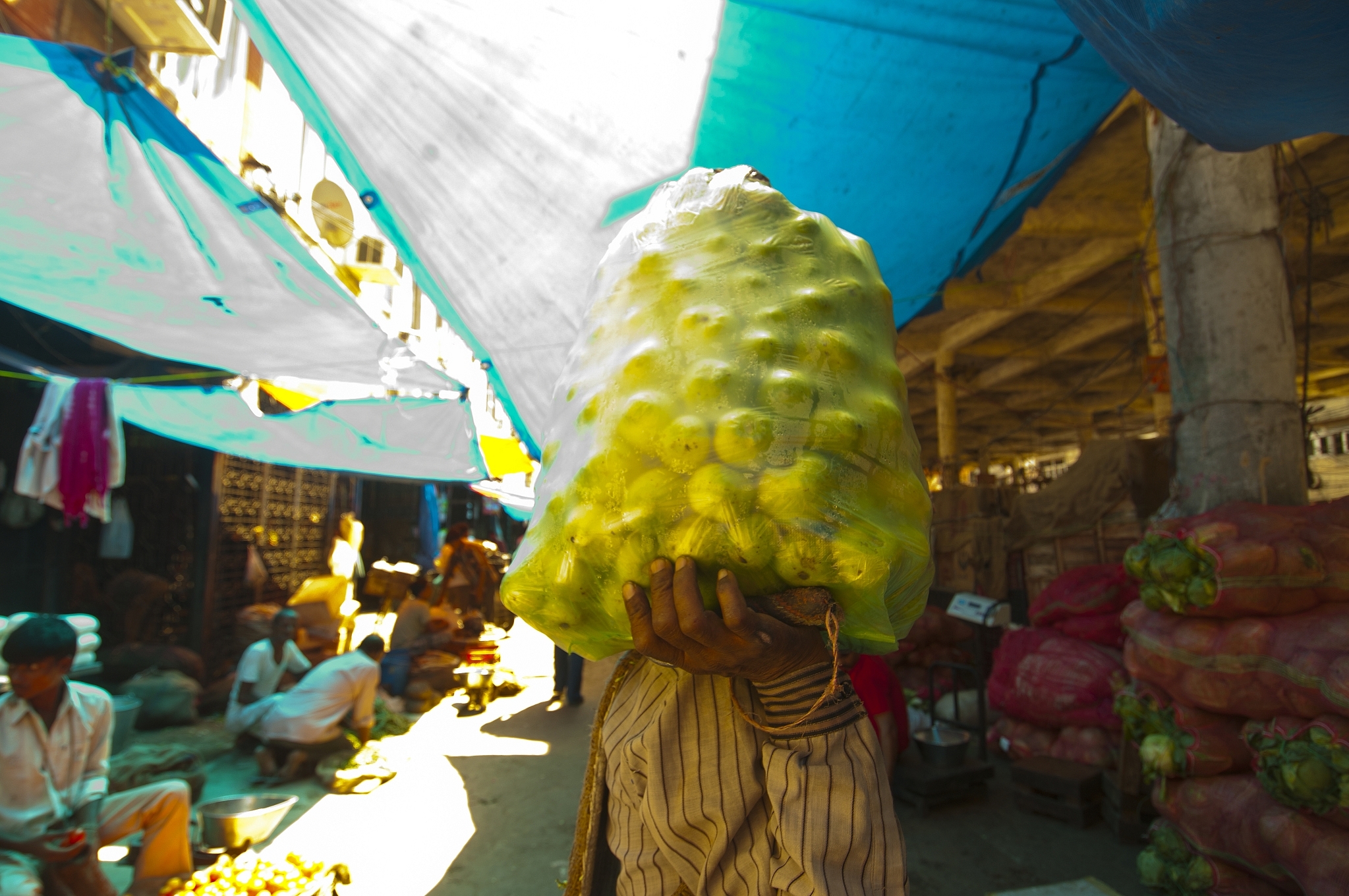 A wholesaler selling vegetables in Azadpur Vegetable in New Delhi, India. (Sneha Srivastava/Mint via Getty Images)