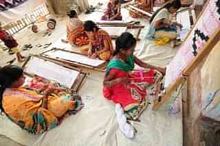 A young generation of weavers of Sambalpuri Ikat at Bargarh, Odisha. (Indranil Bhoumik/Mint via GettyImages)&nbsp;