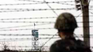 Indian Border Security Force soldier stands guard. (Nitin Kanotra/Hindustan Times via Getty Images)