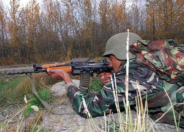 An Indian soldier with the INSAS rifle, during a military exercise. (Pvt. Howard Ketter/Wikipedia). The US-manufactured rifles will replace the INSAS <a href="https://www.devdiscourse.com/news?tag=rifles">rifles</a>