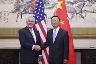 Chinese State Councilor Yang Jiechi (R) shakes hands with U.S. Secretary of State Rex Tillerson. (Lintao Zhang/Getty Images)