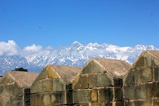  A view of the snow-clad Dhauladhars from the ramparts of the historic Kangra fort in Himachal. (YouTube)