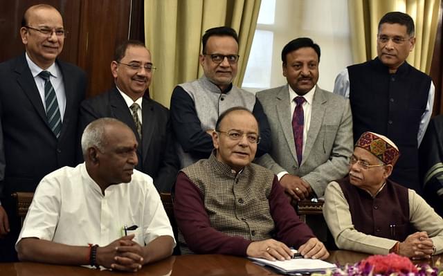 Union Finance Minister Arun Jaitley with his team on the eve of annual budget presentation. (Sonu Mehta/Hindustan Times via Getty Images)