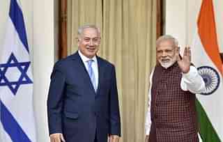 Israeli Prime Minister Benjamin Netanyahu(L) with PM Narendra Modi. (Ajay Aggarwal/Hindustan Times via Getty Images)